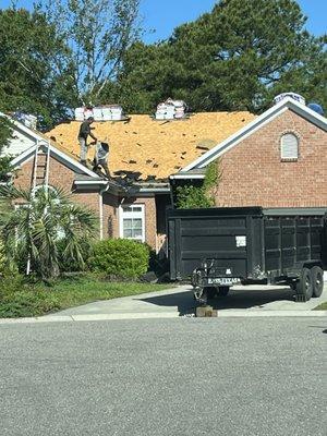 Workers preparing for new roof