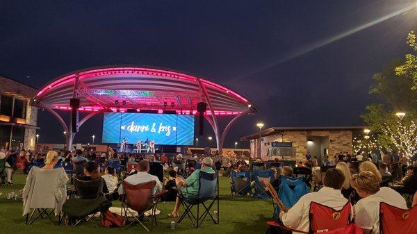 Lawn and stage area with nice lighting and great sound.