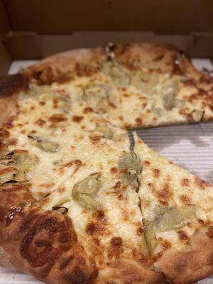 White Pizza with roasted artichoke. Amazing pizza!  Crust perfect soft center and crispy exterior.