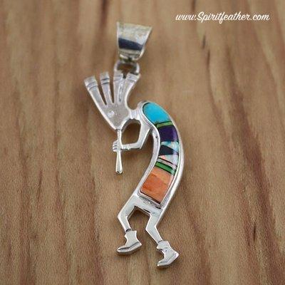 Kokopelli sterling silver and inlaid pendant. Can be found on our website.