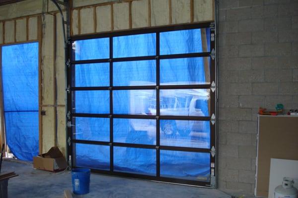 This is a 9 X 10 glass garage door we installed in downtown Denver.