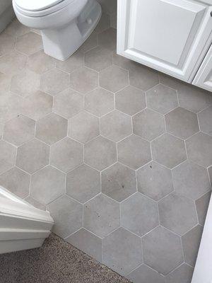 Beautiful hexagonal tiles in a small guest bath. Good sizes for small areas