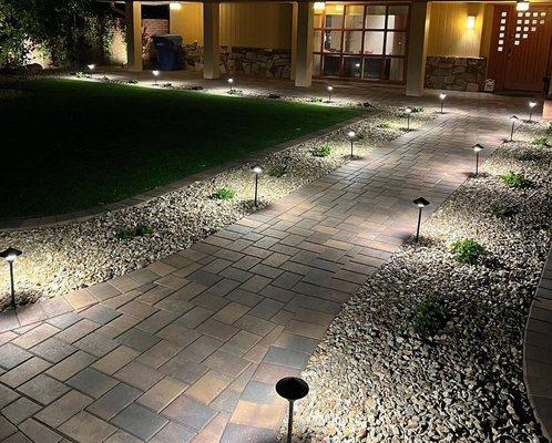 Paver walkway with lighting.