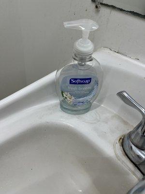 Empty soap bottle in men's restroom!