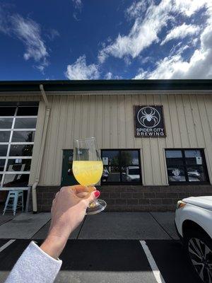 Food truck is parked right outside of this brewery