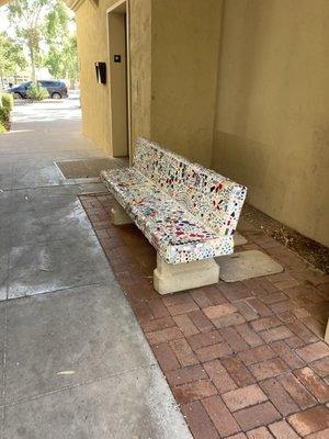 Cute bench right outside the restaurant