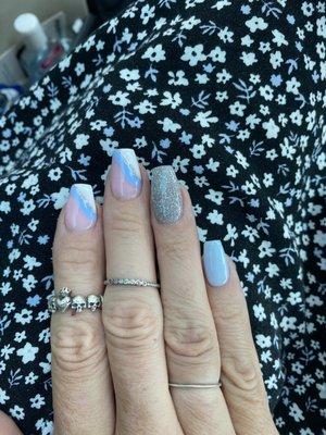 Dip powder blue, pink and sparkle silver, hand painted white, with silver and blue waves,