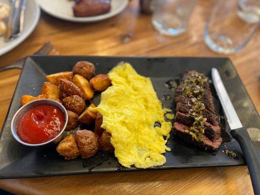 Chimchurri steak with buttery eggs and crisp potatoes.