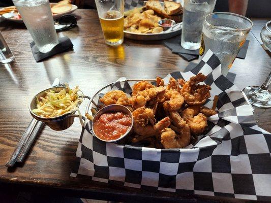 Tasty fried shrimp. Bland slaw. Crispy fries were good.