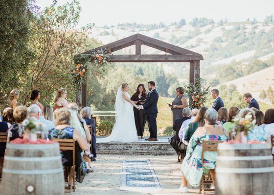 Gorgeous gazebo space for a ceremony with the wine barrels generously included in the venue rental.