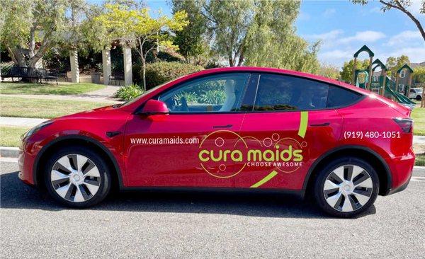 Cura Maids driving to clean your home