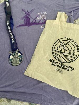 2022 shirt, medal, and tote bag.