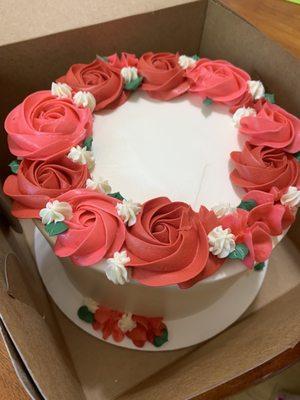 White cake, raspberry filling, and buttercream frosting