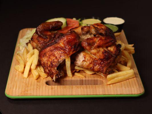 Whole chicken, fries, and salad.