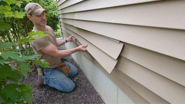 Siding repair after a recent storm.