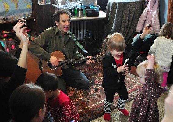 Jay and kids enjoying an All Around This World music class