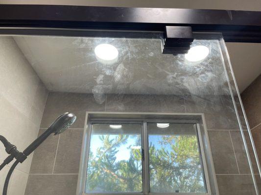 Glass Shower door after job was "cleaned up"!!