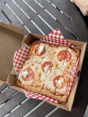 Margarita Pizza (I guess? Or is it cheese with tomato slices)