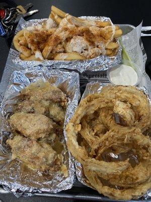 Garlic Parmesan wings (wet) Onion rings  Cajun ranch fries