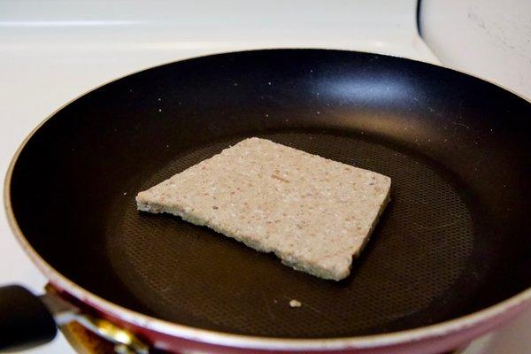 Scrapple: traditionally a mush of pork scraps and trimmings combined with cornmeal and wheat flour, often buckwheat flour, and spices.