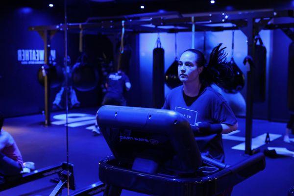 Fitness stations incorporate treadmills, rowers, and weights