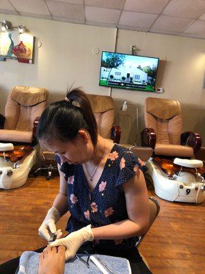 Getting my pedicure done, perfect service as usual.