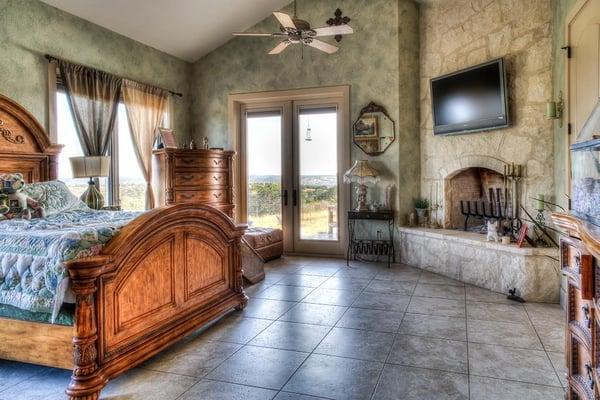 Master suite with fireplace. Large sitting area.