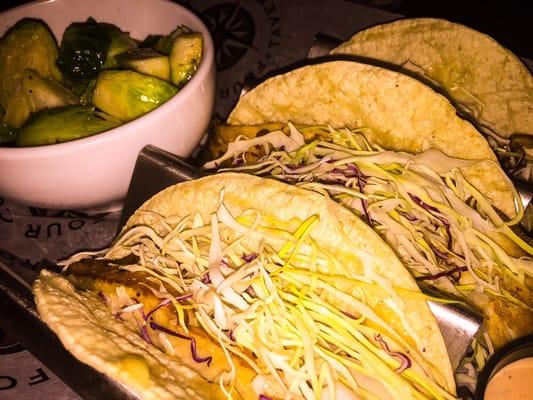 Grilled tilapia tacos on corn tortillas (sauce on the side) and Brussels sprouts