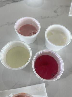 Samples of fresh drinks. Lemonade, dragon fruit drink , strawberry drink