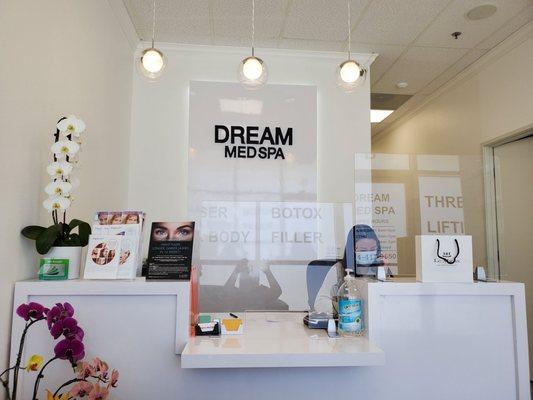 Clara working the front desk at Dream Med Spa.