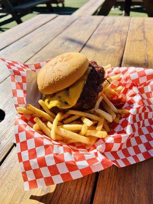 Fancy double cheeseburger with fries