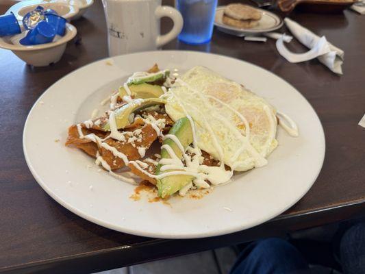 Chilaquiles Rojos with over easy eggs