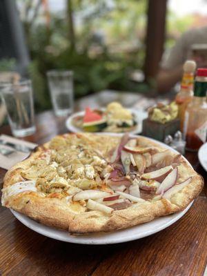 1/2 lemon artichoke pizza; 1/2 bacon and pear pizza