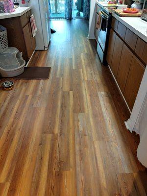 New plank flooring in kitchen.