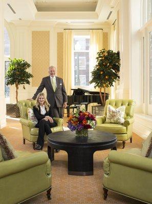 Susan Juroe and Michael Schonbrun, founders of Balfour Senior Living, seated in historic Moffat depot at Balfour Riverfront Park