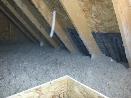 This Bangor, Maine attic was finished with R 60 for cost effectiveness and better thermal performance.