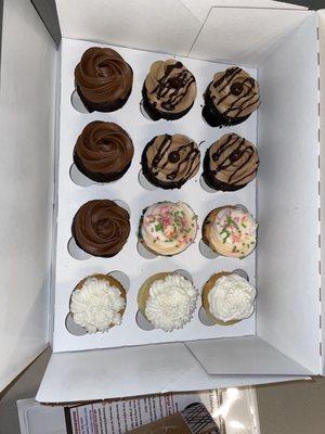 4 Cafe mocha, 2 funfetti, 3 almond wedding and 3 classic chocolate cupcakes