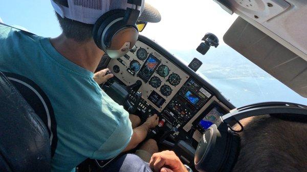 Student pilot practicing steep bank turns with Lani Lea's Flight Instructor.