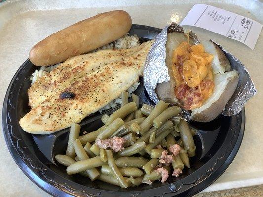 Lemon pepper grilled white fish, green beans, and loaded baked potato