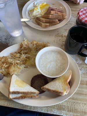 Bradley of grits, sausage, hash browns extra crispy, toast. Yum!