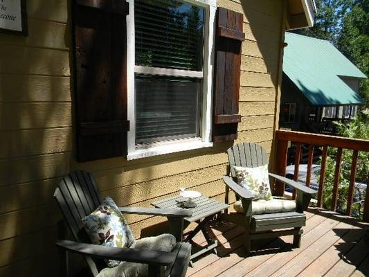 The seating area outside of Pinecone. You can see the office, the highway and into the town of Shaver.