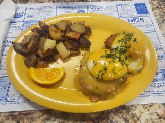 Southern Style Eggs Benedict... fried chicken, cheddar cheese sauce! Interesting take!