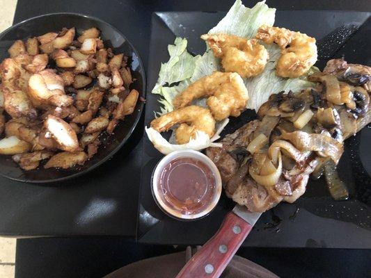 Steak with fried shrimp special and home fries