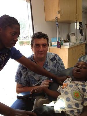 Dr. Trufas volunteers around the world: This fall he traveled to Riverside Farms and providing free dental care to the people of Zambia