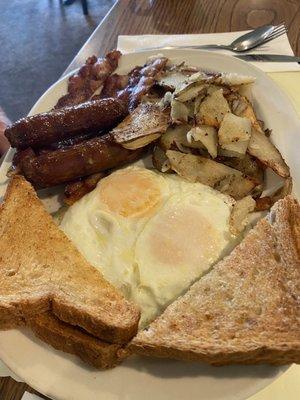 2 eggs over easy , toast, home fries , sausage , bacon