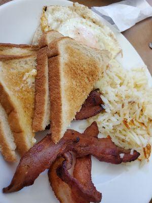 Crispy Bacon, 2 eggs over medium, wheat toast, and hasbrowns