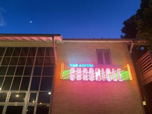 Austin Chronicle refurbished neon sign attached to new 40th St location