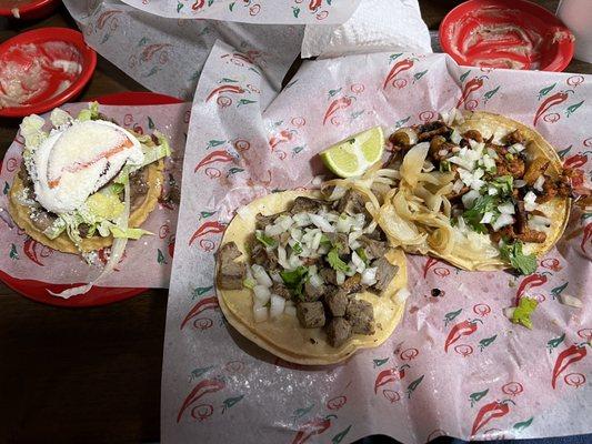 Lengua and al pastor taco with a carne asada sope