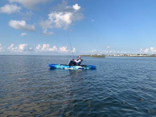 Fishing with grandson in a CBY kayak.