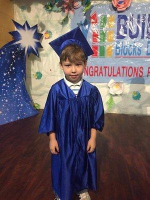 Our first son graduating Pre-K